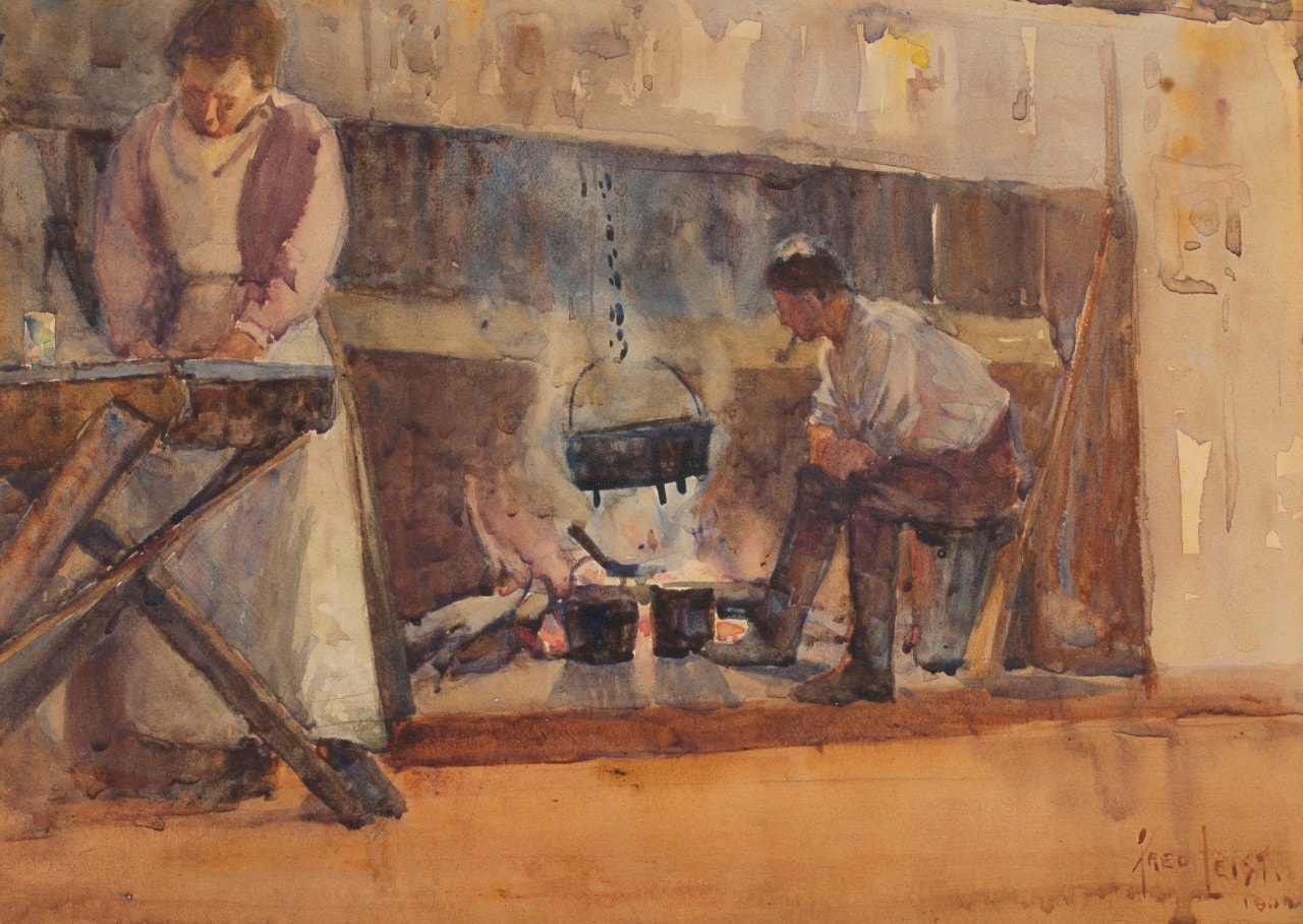 Man and woman in kitchen with fireplace