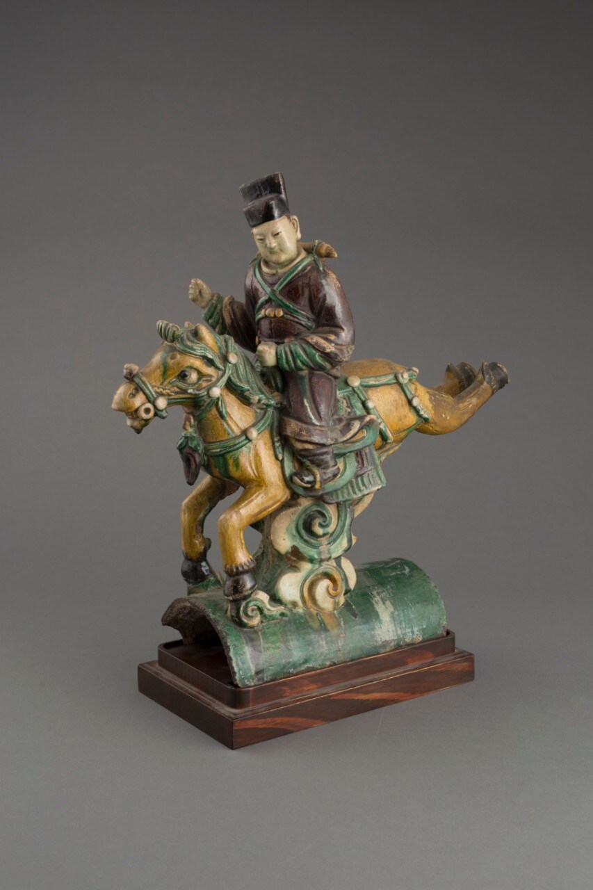 Roof figure of an official on a galloping horse