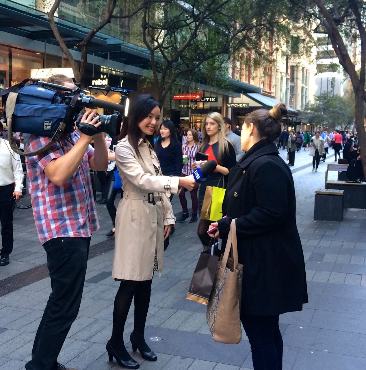 Victoria Ong conducting news vox pops in Sydney