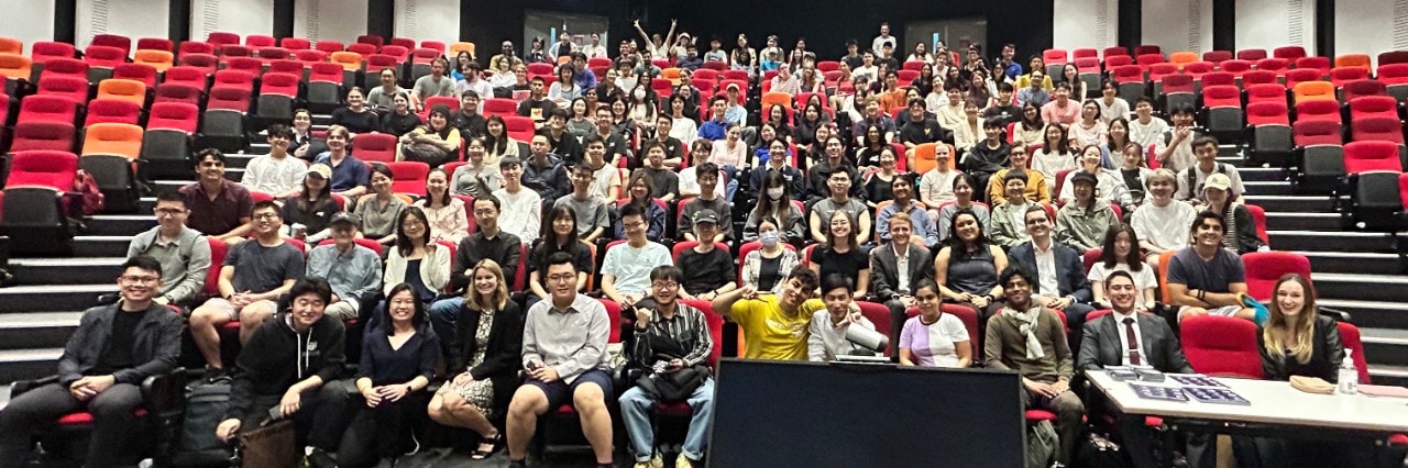 Group photo of Economics students in lecture theatre