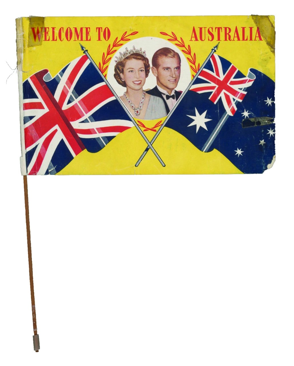 A flag saying welcome to Australia with Queen Elizabeth and Duke of Edinburgh pictured in the centre