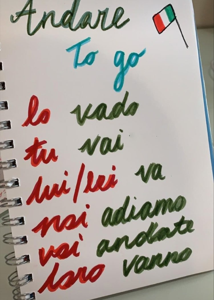 Italian irregular verbs written in a notebook