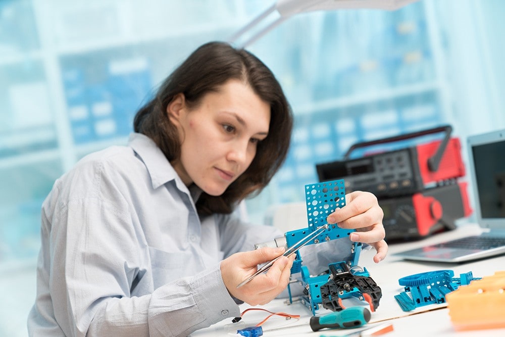 Woman studying mechatronic project