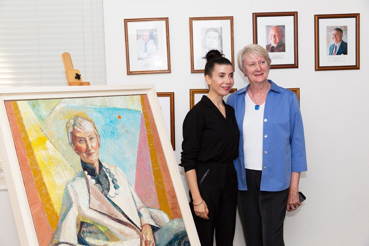 Yvette Coppersmith and Professor Anne Green pose with the portrait