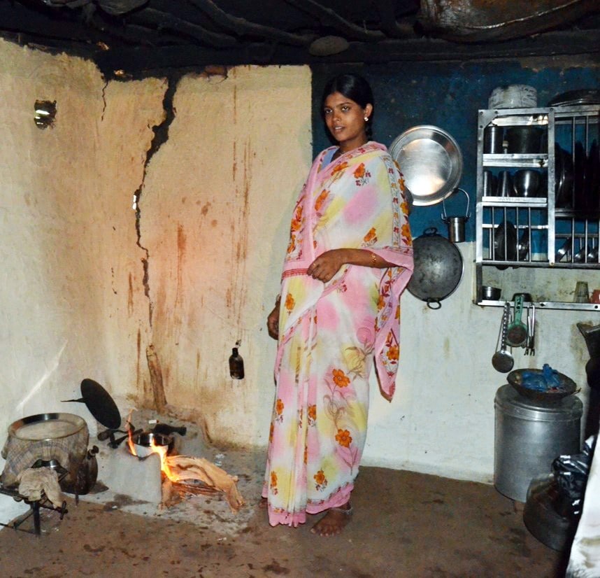 Woman with traditional cooking stove in Bangladesh 