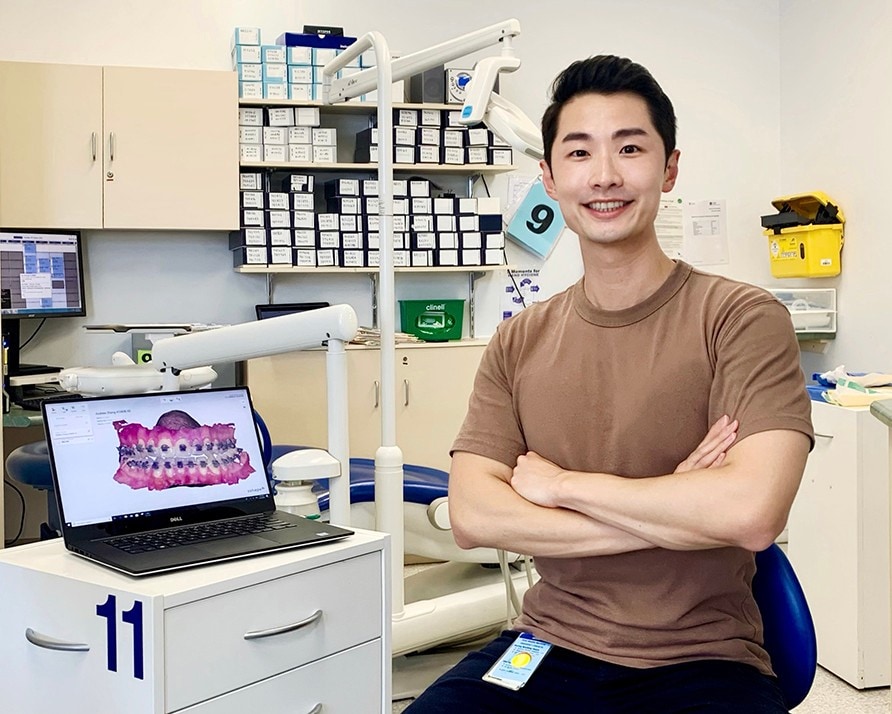 Orthodontics student Andrew Zhang in clinic