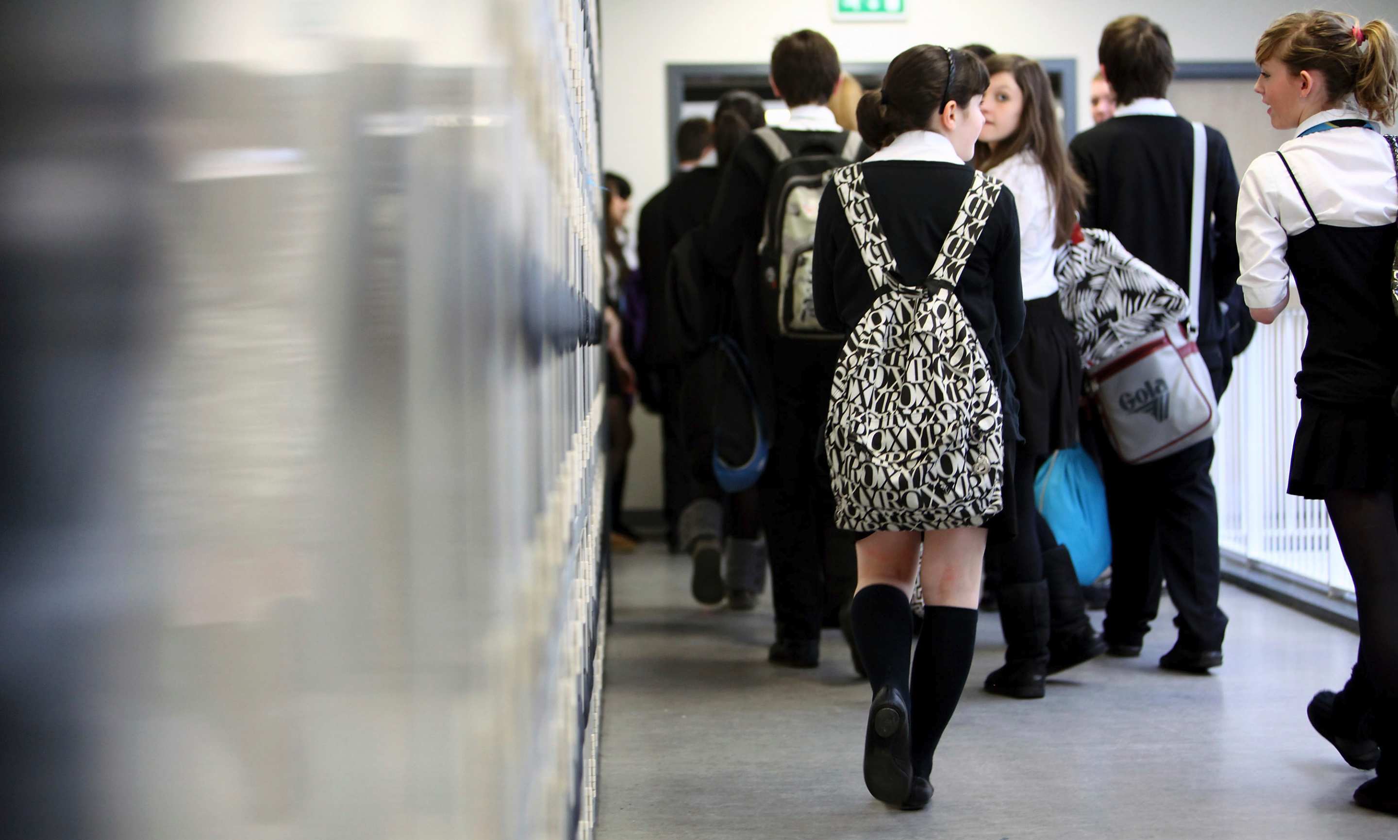 High school students make their way to a classroom. Image: iStock