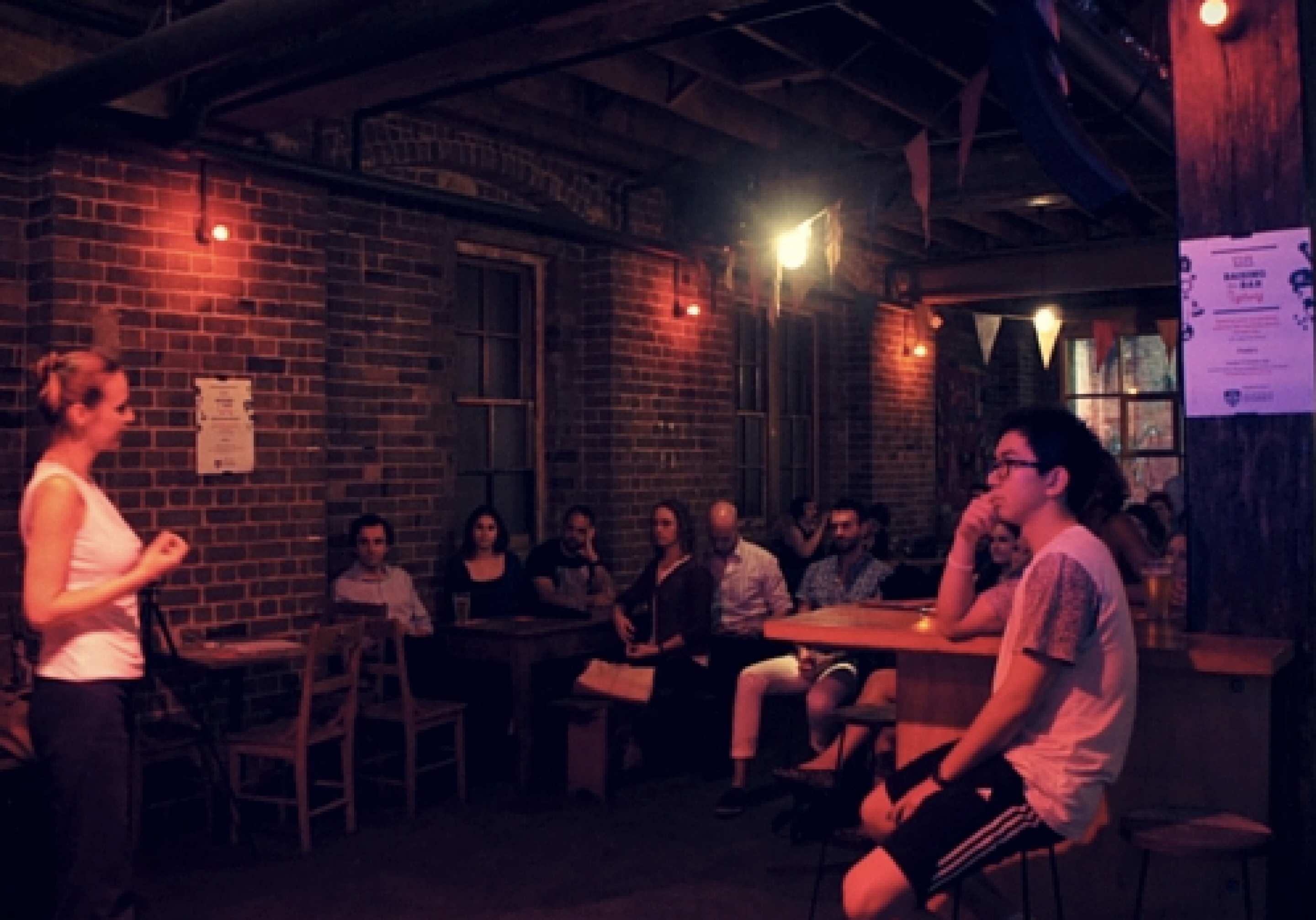 Dr Agnieszka Tymula speaking at Freda's during Raising the Bar Sydney 2015.