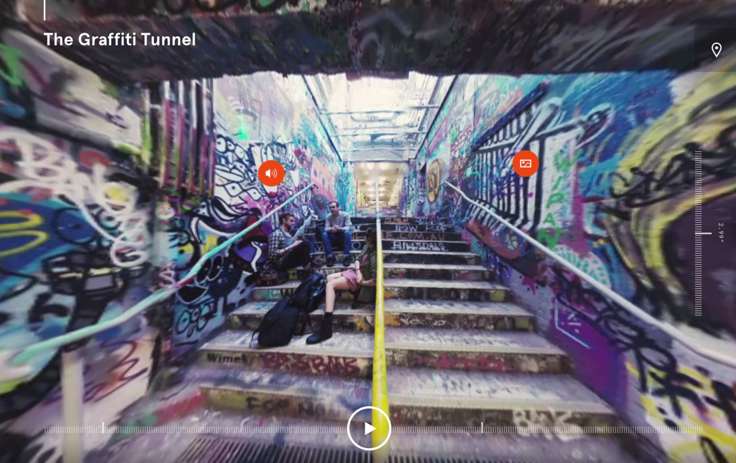 Students sitting in the grafitti tunnel at the University of Sydney taken in a screen shot taken form the virtual tour.  