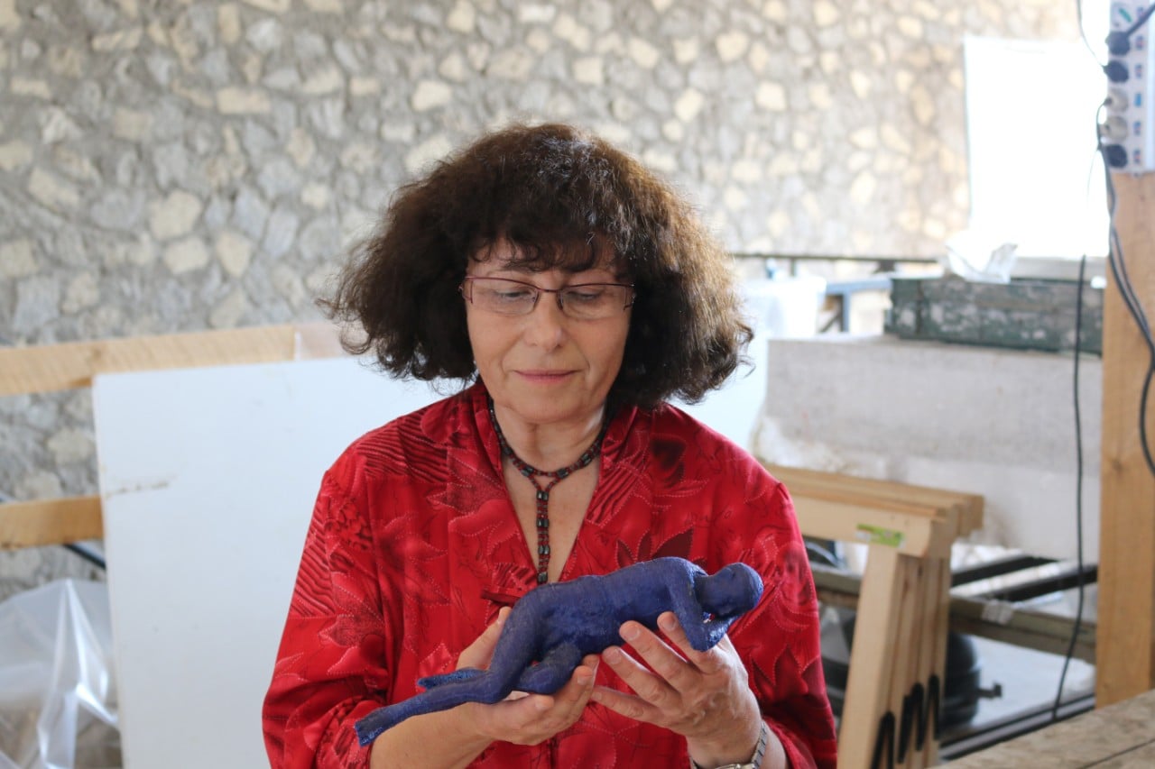 Dr Estelle Lazer holds a 3D print of a Pompeian cast. Image: Gianni Quaranta
