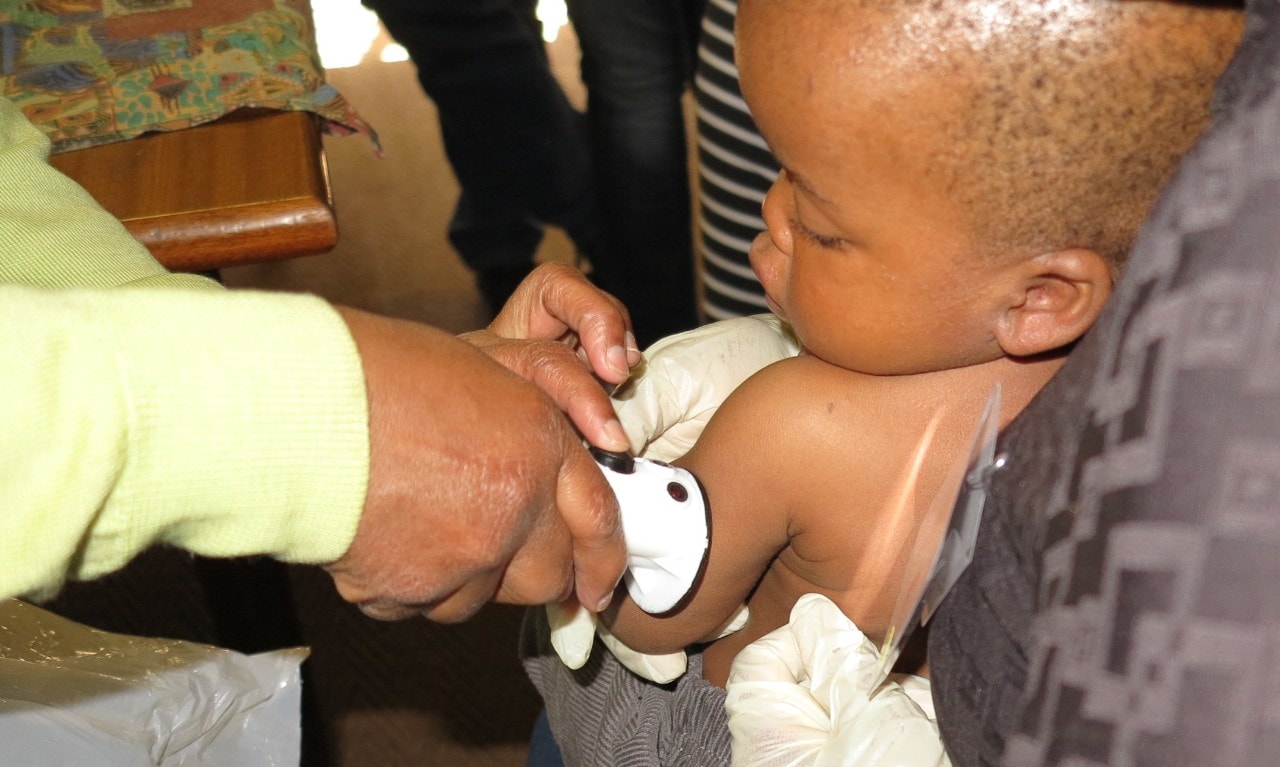 Baby being measured for malnutrition levels 