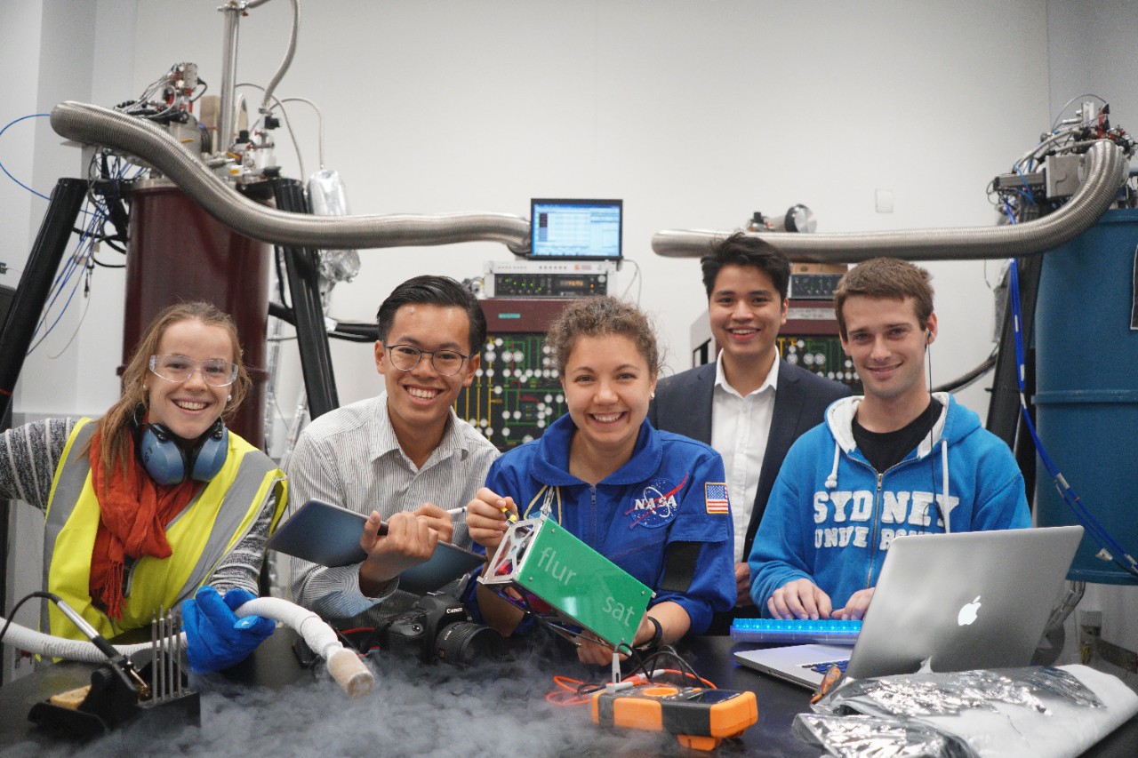 Students inventing the future: (L-R) Xanthe Croot (School of Physics), Christopher ChaN (Faculty of Architecture, Design and Planning), Anastasia Volkova (School of Aeronautical, Mechanical and Mechatronic Engineering), Brandon Cabanilla, (University of Sydney Business School) and Malcolm Ramsay (School of Computation Chemistry).