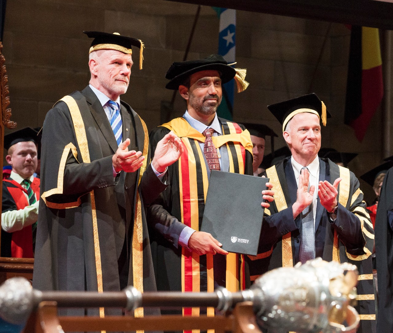 Pro-Chancellor Peter Fitzsimons AM, Adam Goodes and Vice-Chancellor and Principal Dr Michael Spence. 