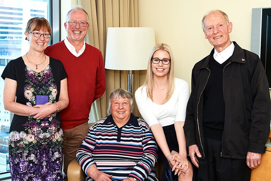 Bethany Robinson (second from right) with Peter Harrison (far right) and his family. 