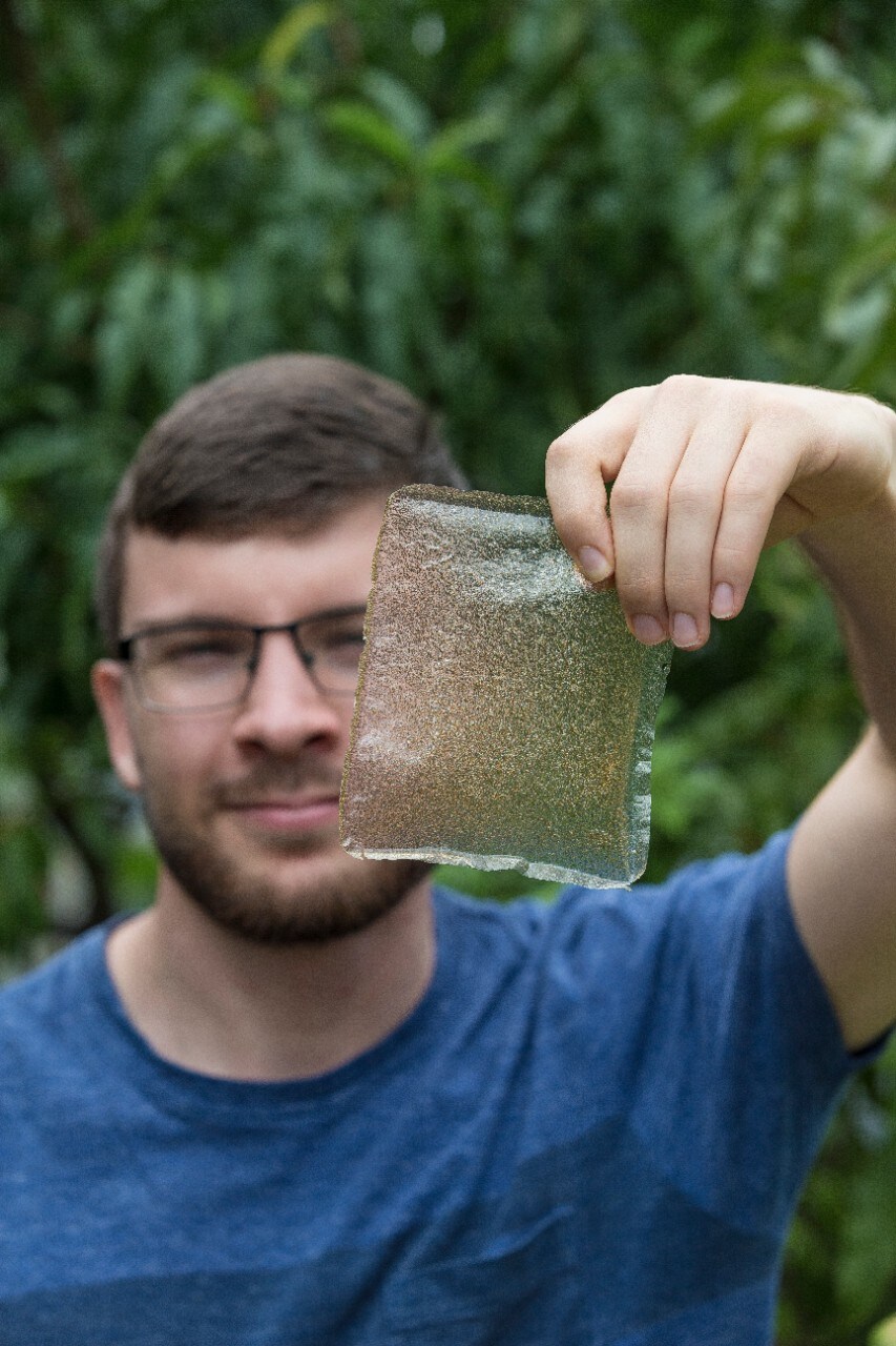 Chemist Jared Wood with BioChite's biodegradable plastic.
