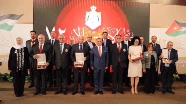 Professor Zreiqat (second from right) with the other distinguished people bestowed medals by His Majesty King Abdullah II (centre) at an official celebration at Al Husseiniya Palace. 