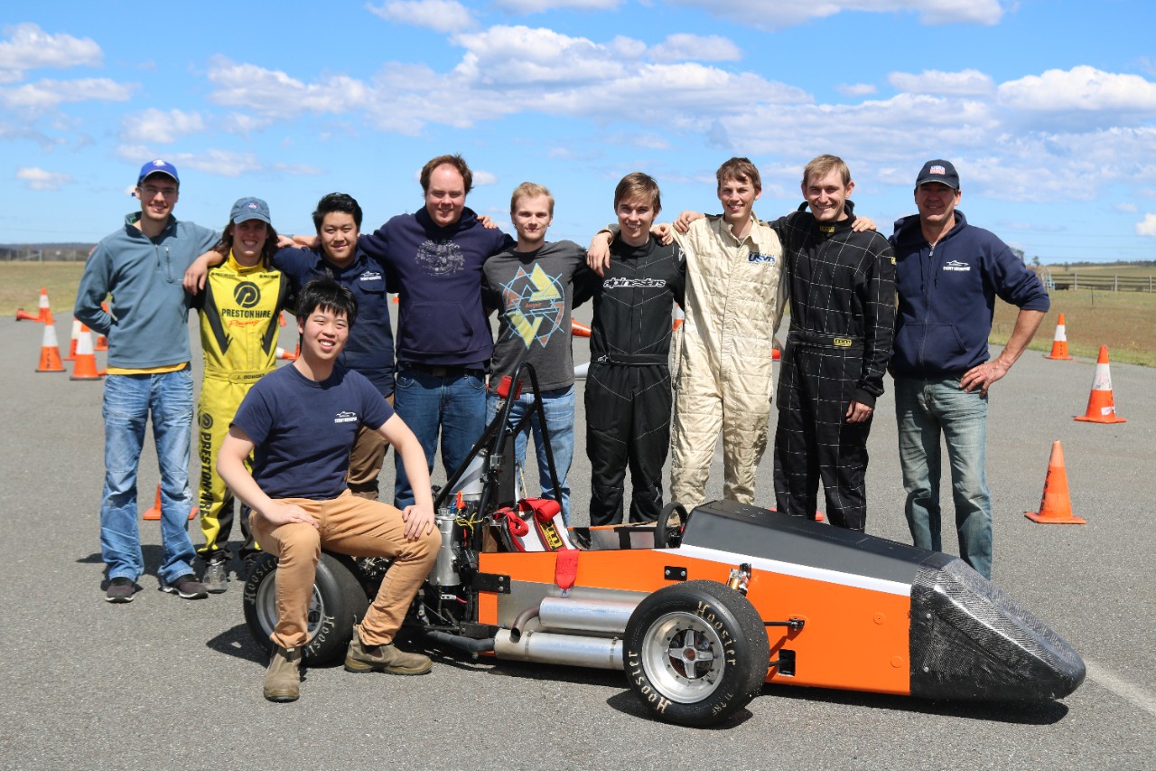 Chief Engineer Stephen Zi Yang Huang (front left) and the Sydney Motorsports team have been test driving their 2018 competition vehicle at the University farm in Marulan.