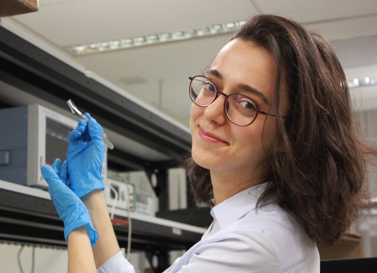 Photo of Ezgi Sahin, a PhD student at Singapore University of Technology and Design in the lab