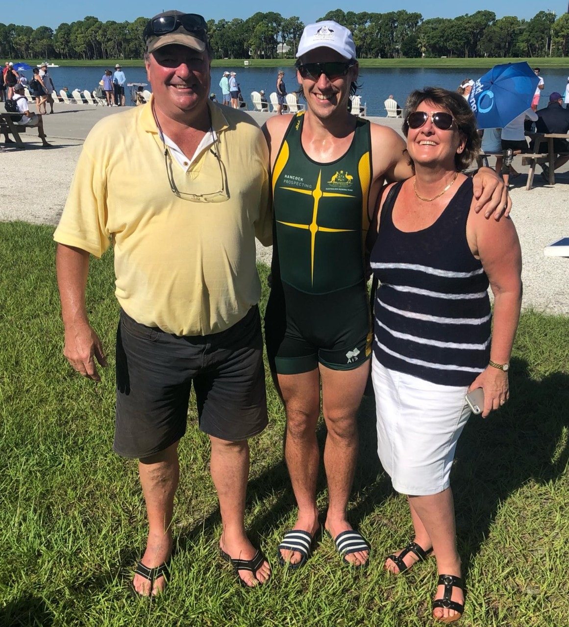 Marcus Britt (middle) with his parents at the under 23 World Rowing Championships in Sarasota, Florida.