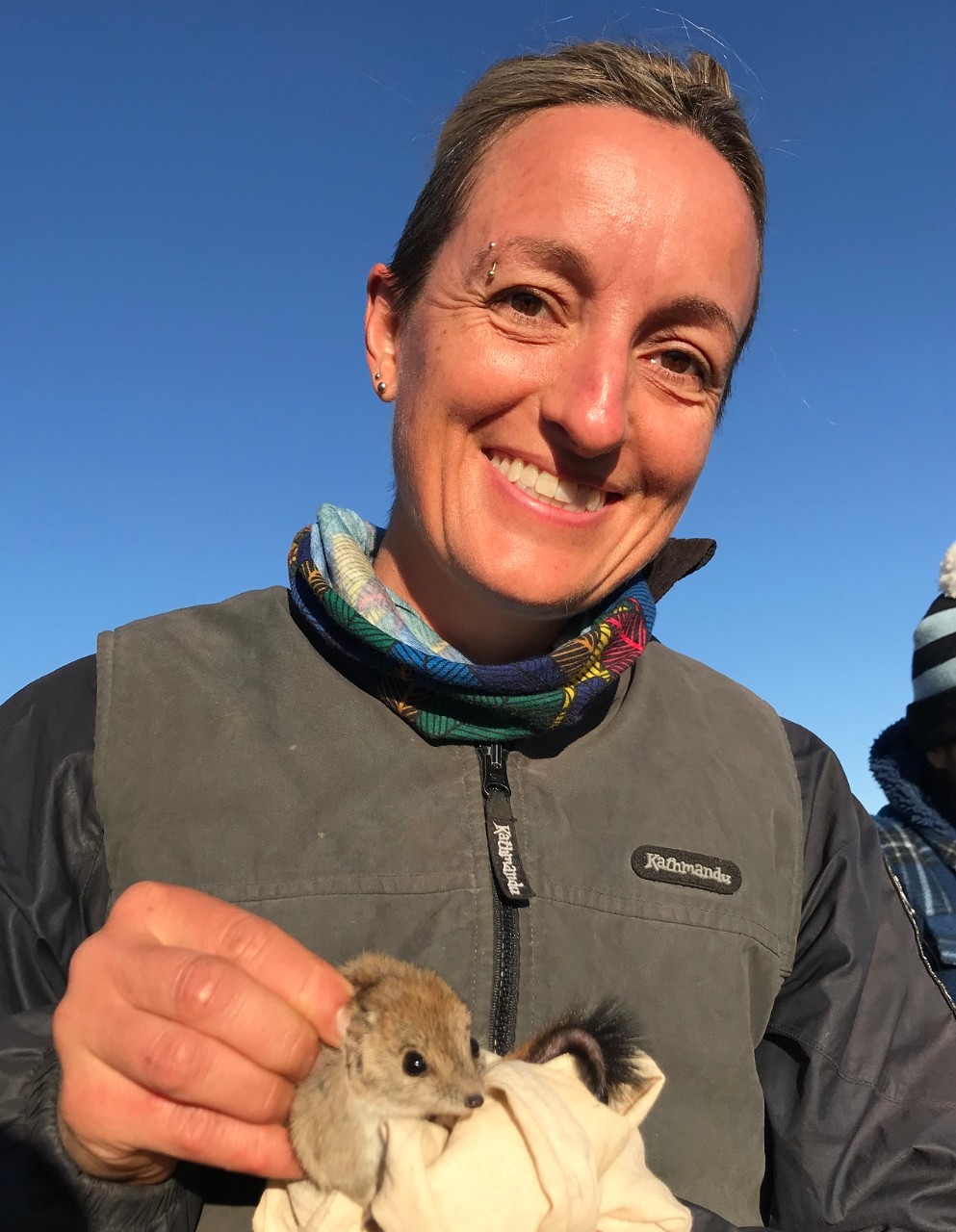 Dr Ayesha Tulloch with a mulgara. Credit: Al Healy. Top of page: Mt Hay in late February. Credit: Dr Aaron Greenville.