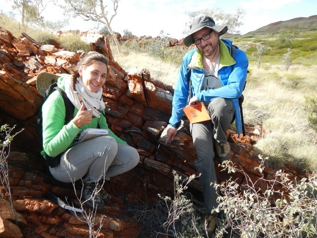 Dr Claire Mallard (left) and Professor Nicolas Coltice at the site where the chert was excavated in the Pilbara. Photo: Patrice Rey