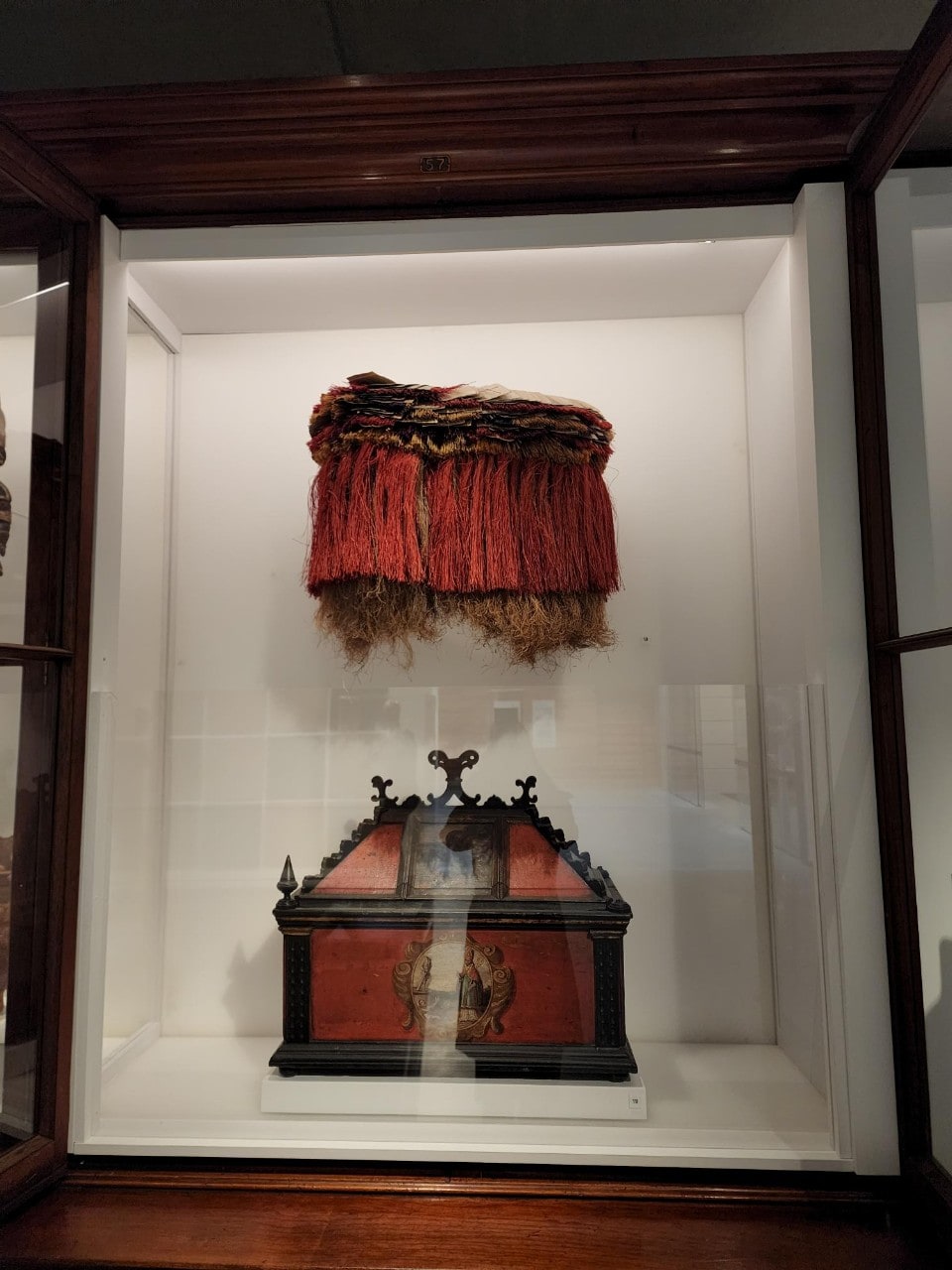 photo of a red grass skirt from Papua New Guinea, known as a bridal skirt