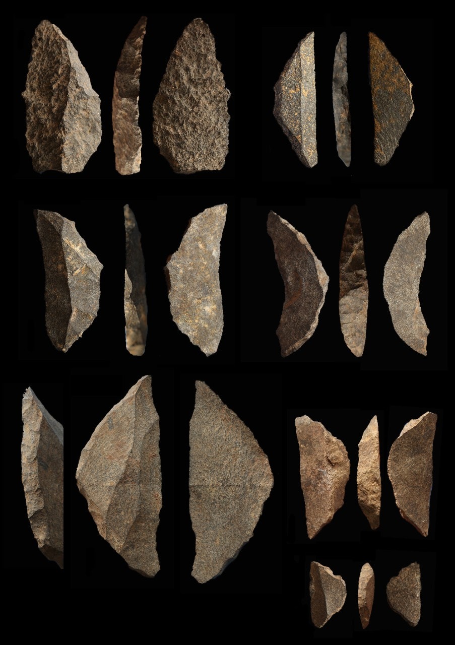 photo of stone blades on a black background, they are matte in texture
