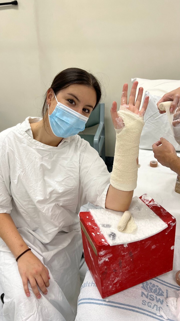 Maddi Eveleigh in a test plaster as part of her Doctor of Medicine 