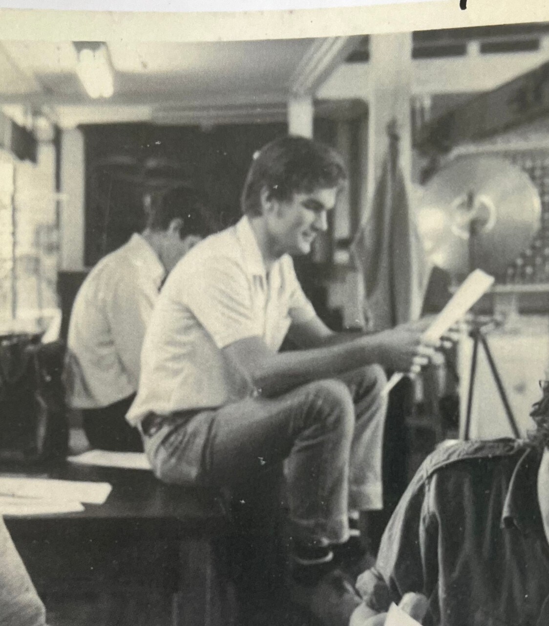 Old photo showing David Bell sitting on a table in a physics lab in 1969