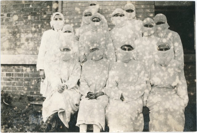 A group of women wearing protective clothing during the 1919 influenza epidemic