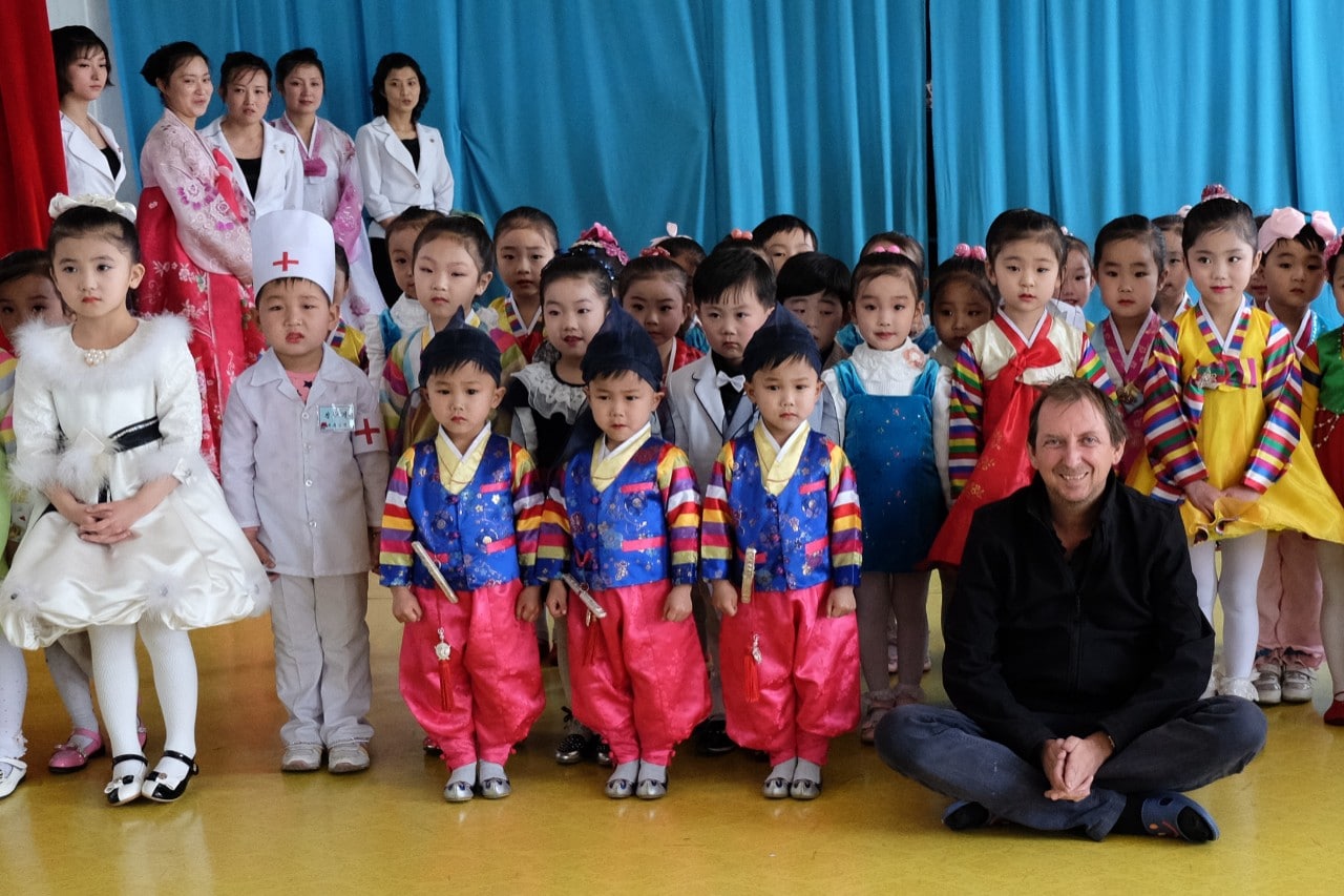 Fabian Muir with children in North Korea
