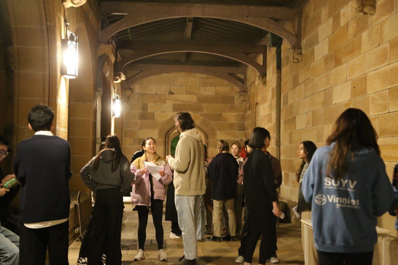 Students socialising in the Quad at the University of Sydney.