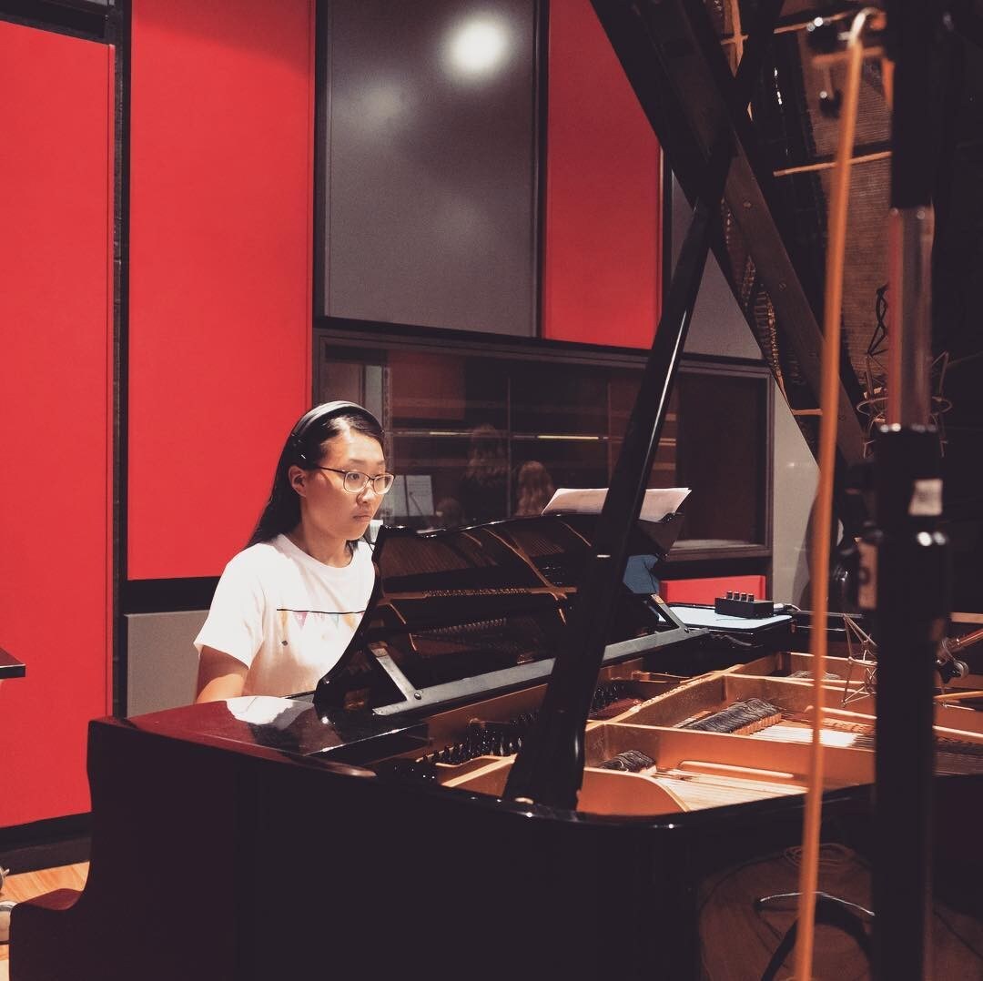 Christine Pan in the recording studio. Ms Pan is a graduate in Composition.